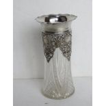 A hallmarked silver and cut glass vase standing approx 15cm high.