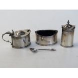 A hallmarked silver cruet set, HM for Chester, comprising pepperette,