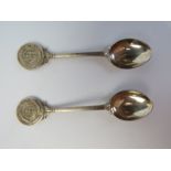 A pair of hallmarked silver spoons with CHC monogrammed terminals, 47.2g / 1.