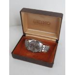 A stainless steel Seiko 5 automatic wrist watch with day and date apertures in original