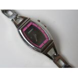 A ladies stainless steel Fossil wrist watch having pink chapter ring numbered ES9677 250311