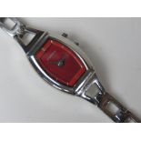 A ladies stainless steel Fossil wrist watch having red dial numbered ES-9566 250303