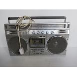 A Sharp stereo radio tape recorder model GF-8989E.