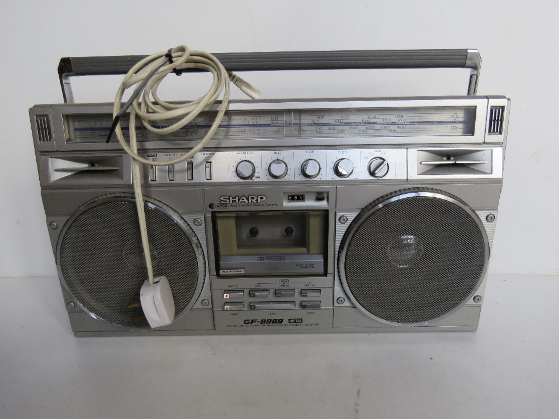 A Sharp stereo radio tape recorder model GF-8989E.