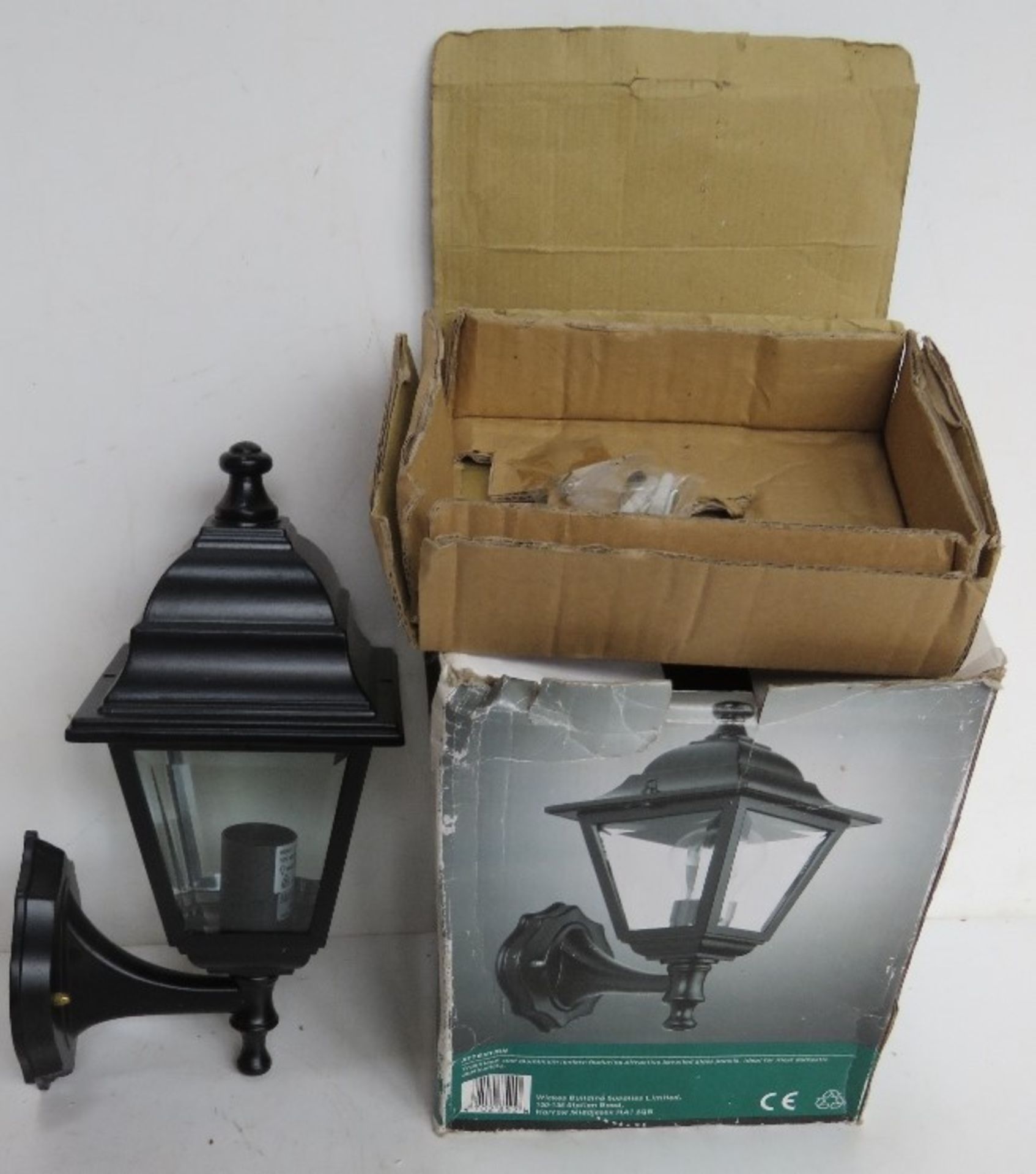 A contemporary outdoor wall light in original box.