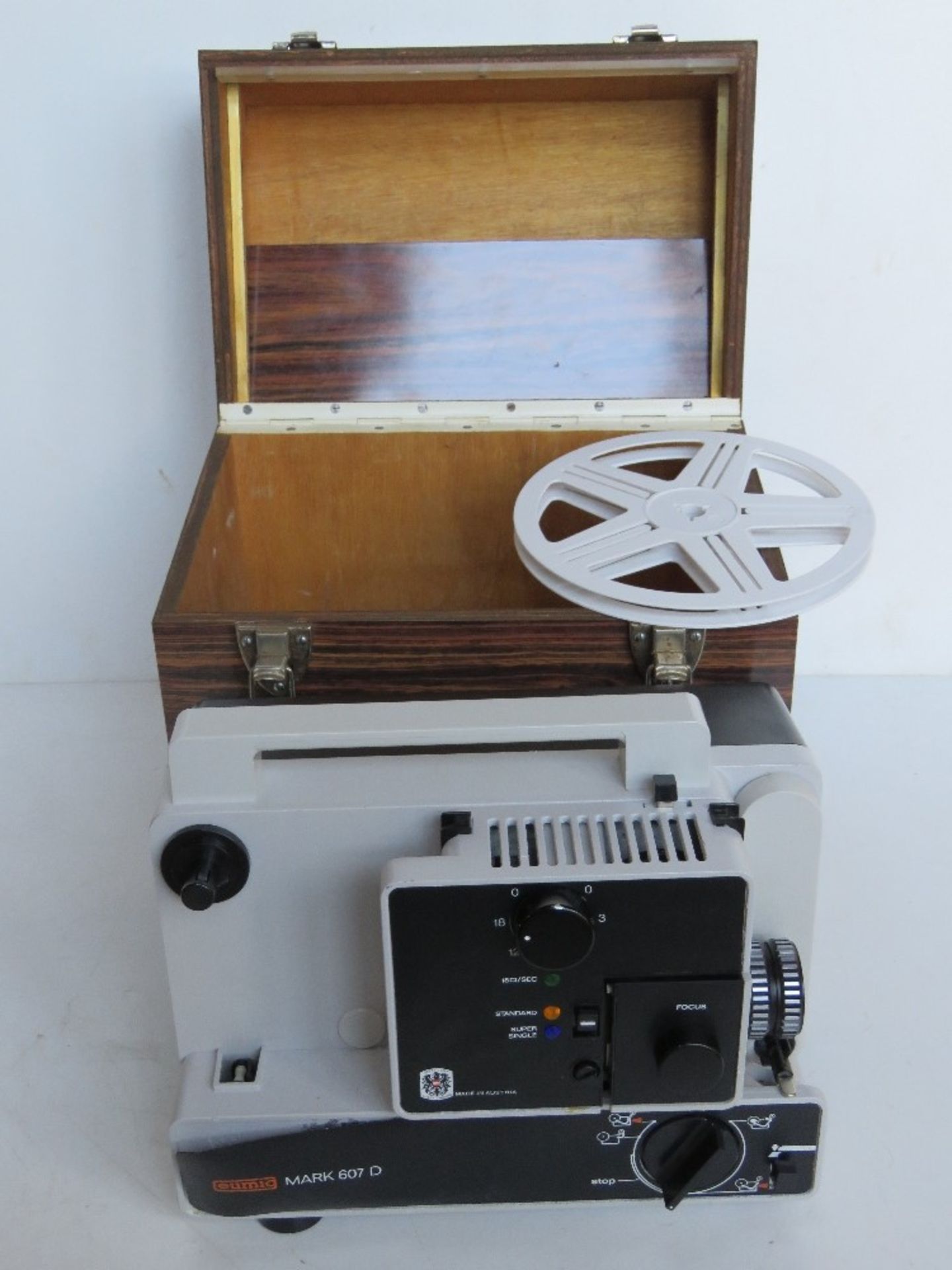 A Eumig Mark 607D projector in case.