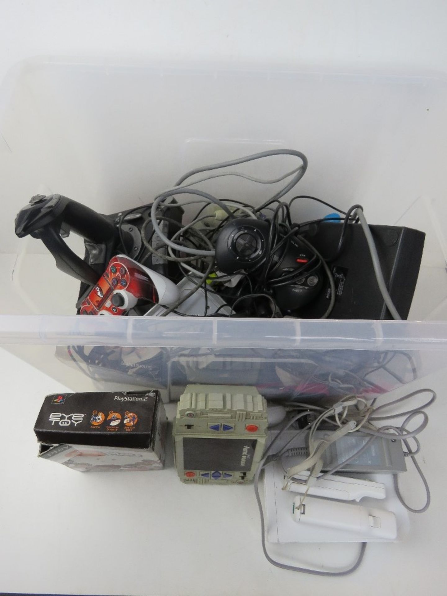 A quantity of assorted video games, accessories, inc a Wii console, Playstation EyeToy,