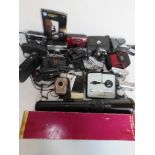 A quantity of assorted cameras and associated items inc Kodak Instamatic cameras, Canon Sure Shot,