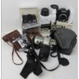 A quantity of cameras and equipment inc Ricoh XR lens in original box, Ricoh KR-10 in original box,