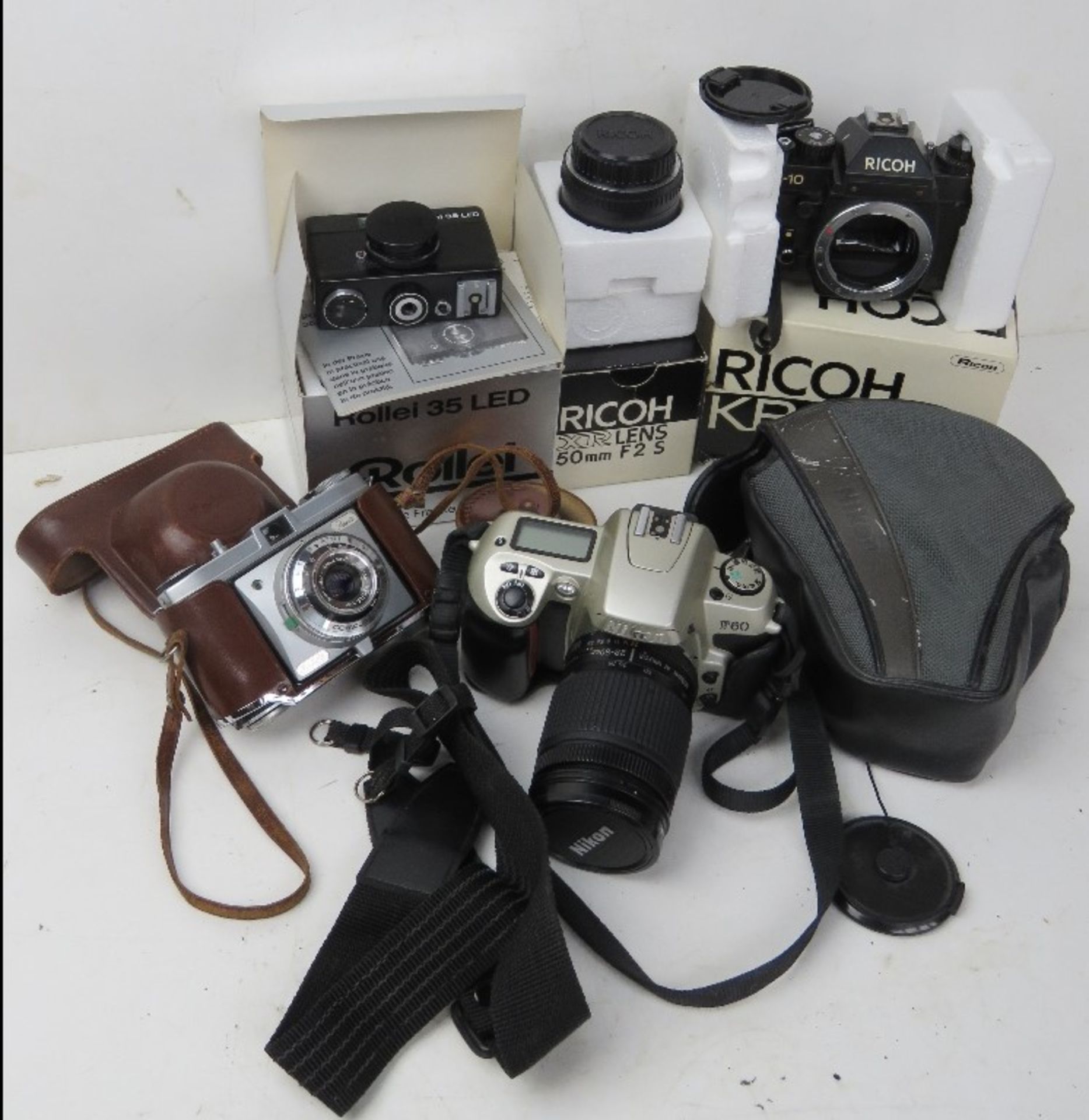 A quantity of cameras and equipment inc Ricoh XR lens in original box, Ricoh KR-10 in original box,