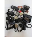 A quantity of assorted cameras and accessories inc Konica TC-X, Chinon, Flashmatic, etc.