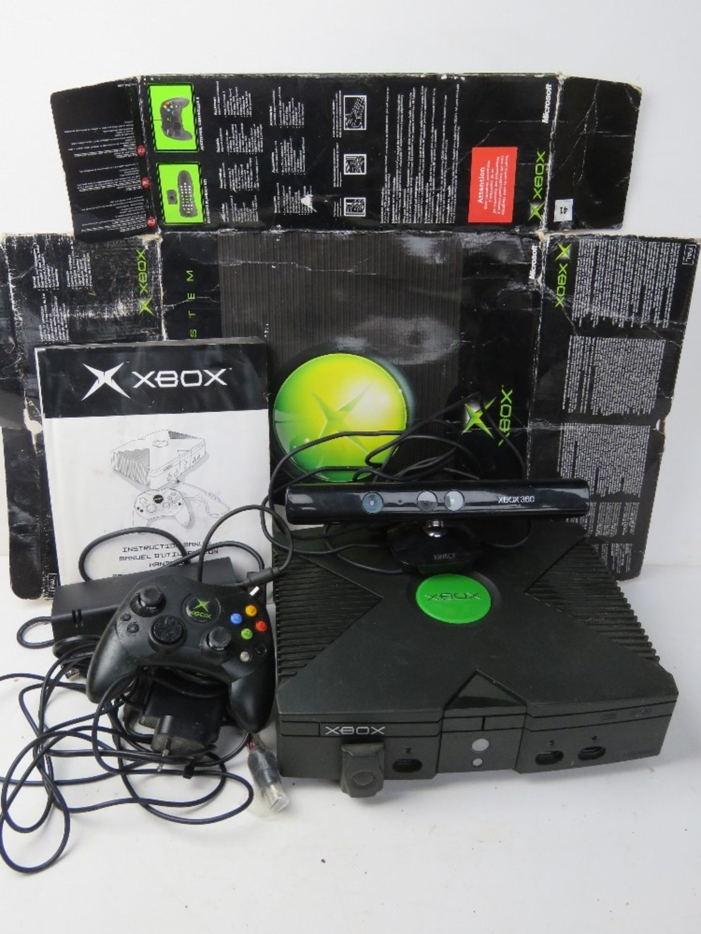 An XBox in original box including instructions, controller and cables, box a/f.