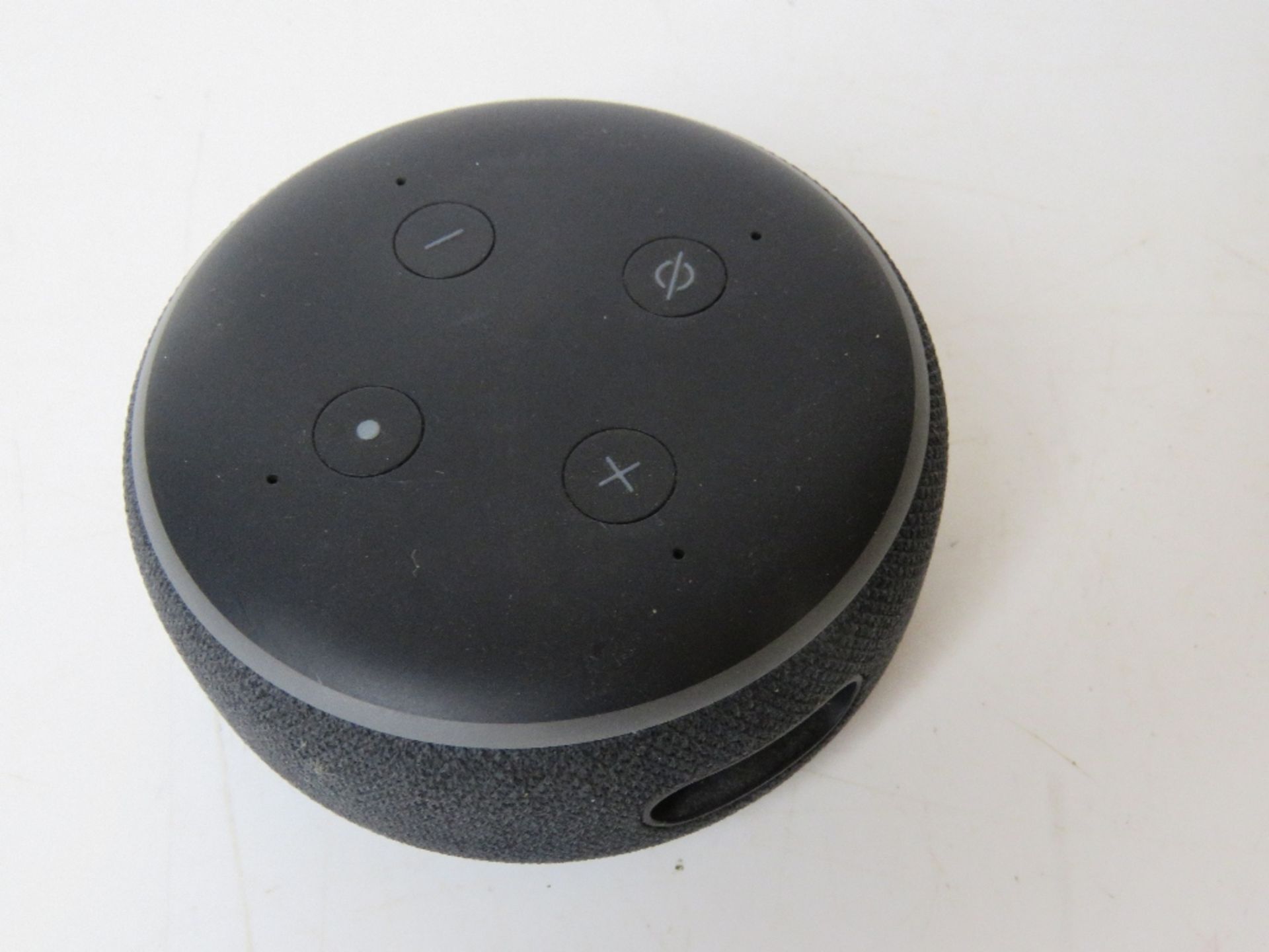 An Amazon Echo Dot, no cable.