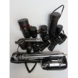 A quantity of photographic equipment inc lenses and tripod, Tamron lenses noted.