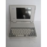 A vintage Toshiba T1950CT/200 System Unit laptop. No cables.