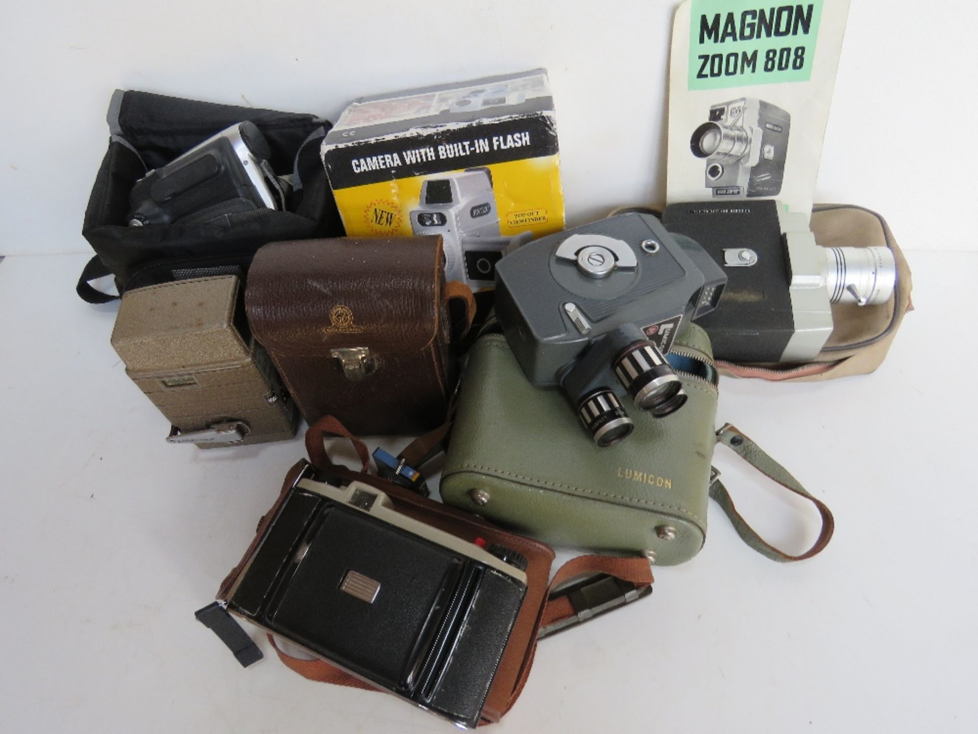 A quantity of assorted cameras inc Lumicon, Magnon Zoom 808, Bell & Howell, Samsung video camera,