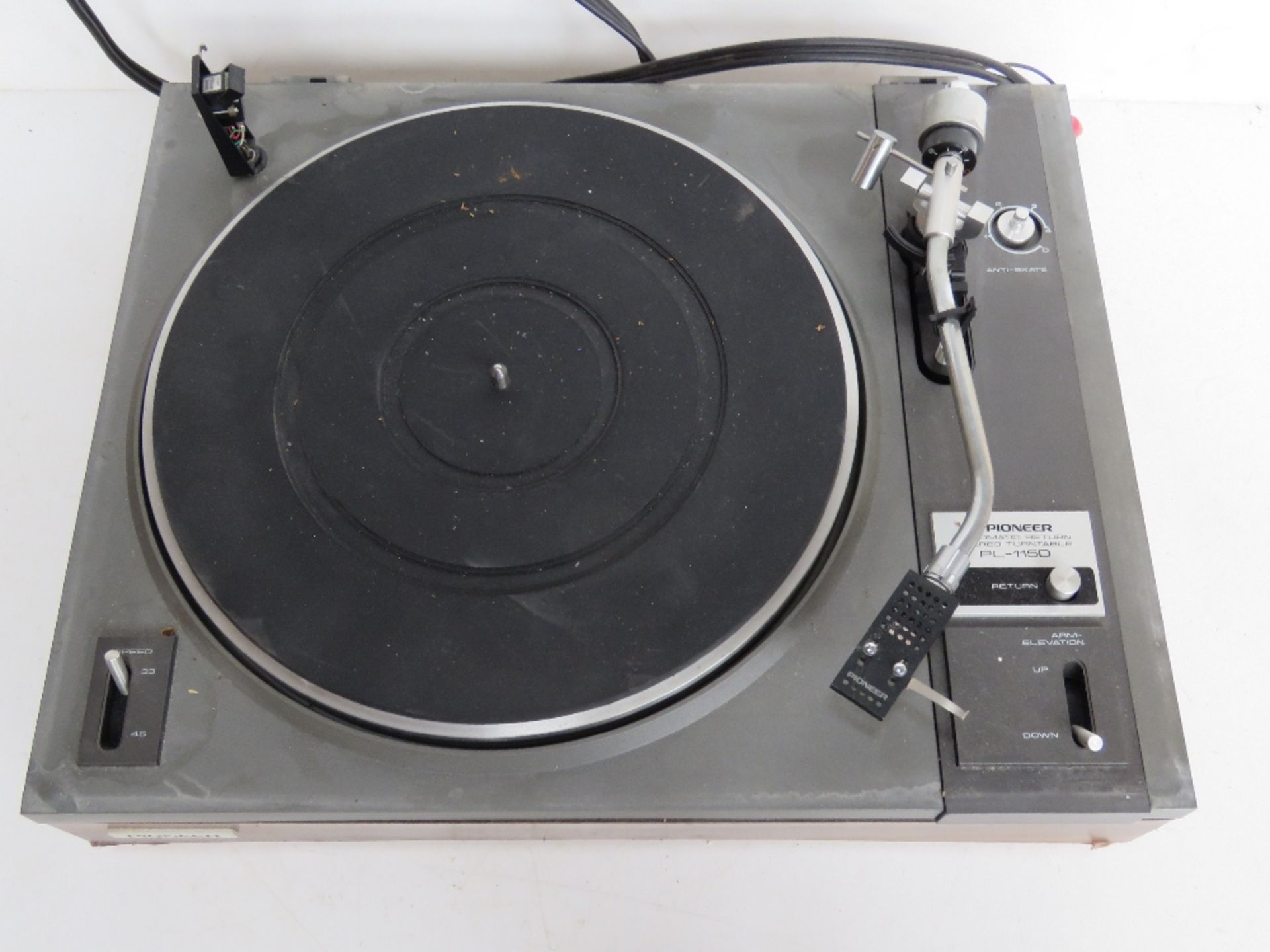 A Pioneer Automatic Return stereo turntable PL=115D, lid deficient.