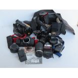 A quantity of cameras and equipment inc Zenit, Sony Camcorder, Canon Speedlite flash,
