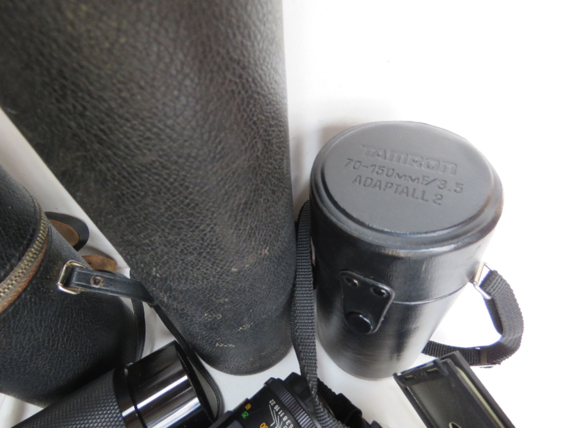 A quantity of photographic equipment inc lenses and tripod, Tamron lenses noted. - Image 7 of 7