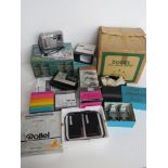 A quantity of assorted camera accessories inc Zodel Movie Editor, Stellar Slide Viewer,