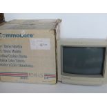 A Commodore Monitor 1084S in original case with packaging.