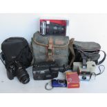 A quantity of cameras and camera equipment inc Canon Camcorder, Nikon, Prinz Flashgun,