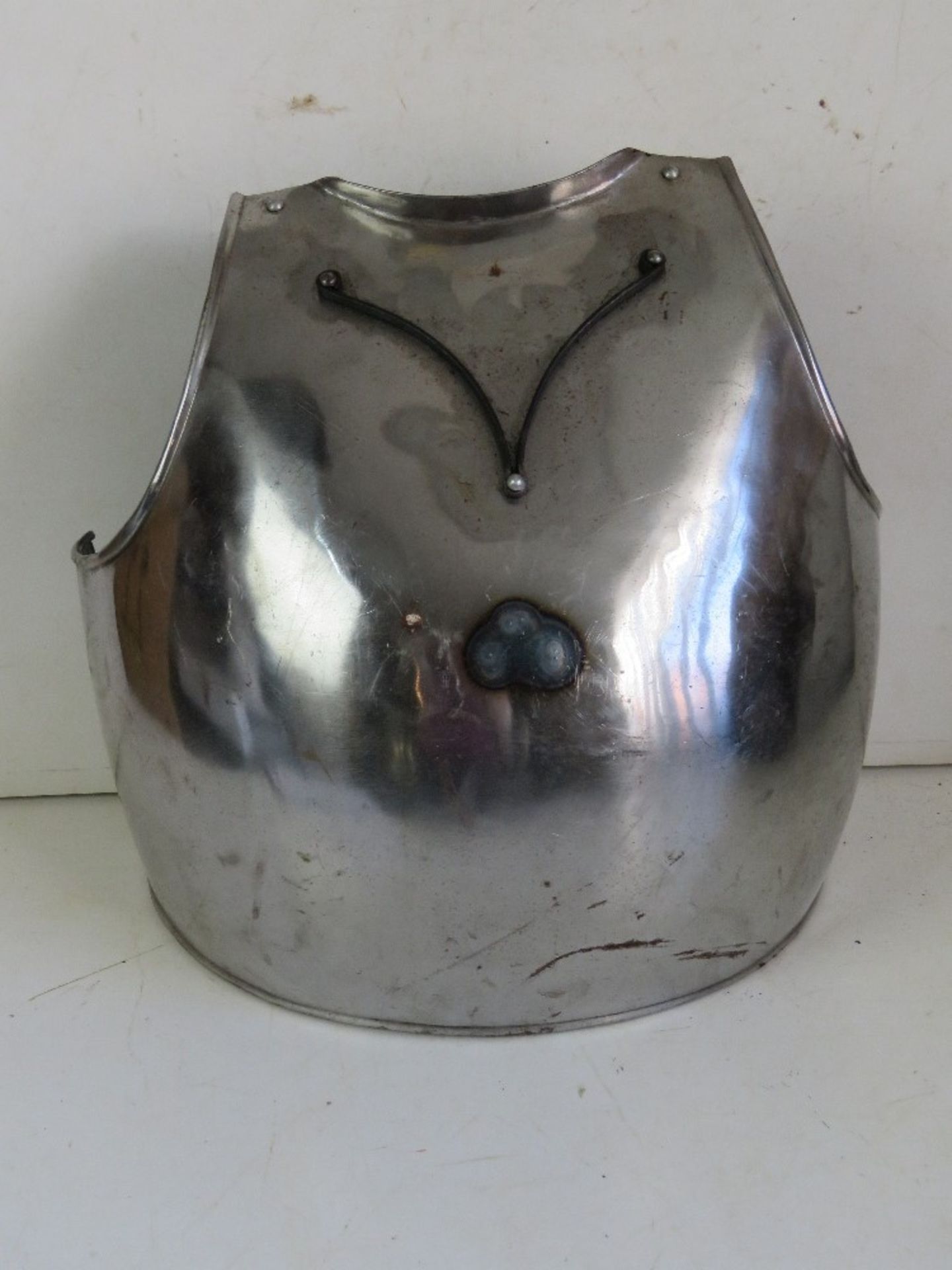 A reproduction civil war front armour plate with straps. For decorative purposes.