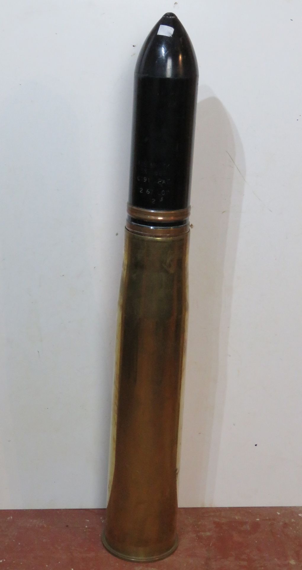 An inert 105mm TK HESD shell, the case dated 1986 with clear markings,