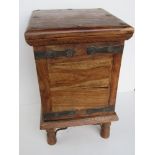 A Sheesham wood side table with lift up lid, measuring approx 37 x 37 x 59.5cm.