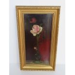 Oil on canvas of roses in bud vase, signed indistinctly lower right and dated 1900,