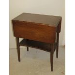 An early 20thC fold-over occasional table having rotating top and measuring approx 75 x 56cm,