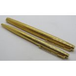 A Parker '75' Ciselle fountain pen and ballpoint pen set, fountain pen having 14ct gold nib,