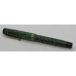 A Parker Duofold 'Streamline Junior' fountain pen with 14ct gold nib, 'jade' green marbled case, c.