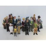 A quantity of ceramic dolls house figurines.