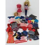 Sindy; Two dolls being Sindy (a/f) and Skipper and a quantity of assorted clothing.
