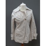 A 98% cotton UK size 12 M&S coat.