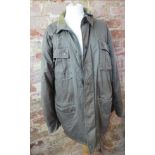 A 100% cotton coat having corduroy colla