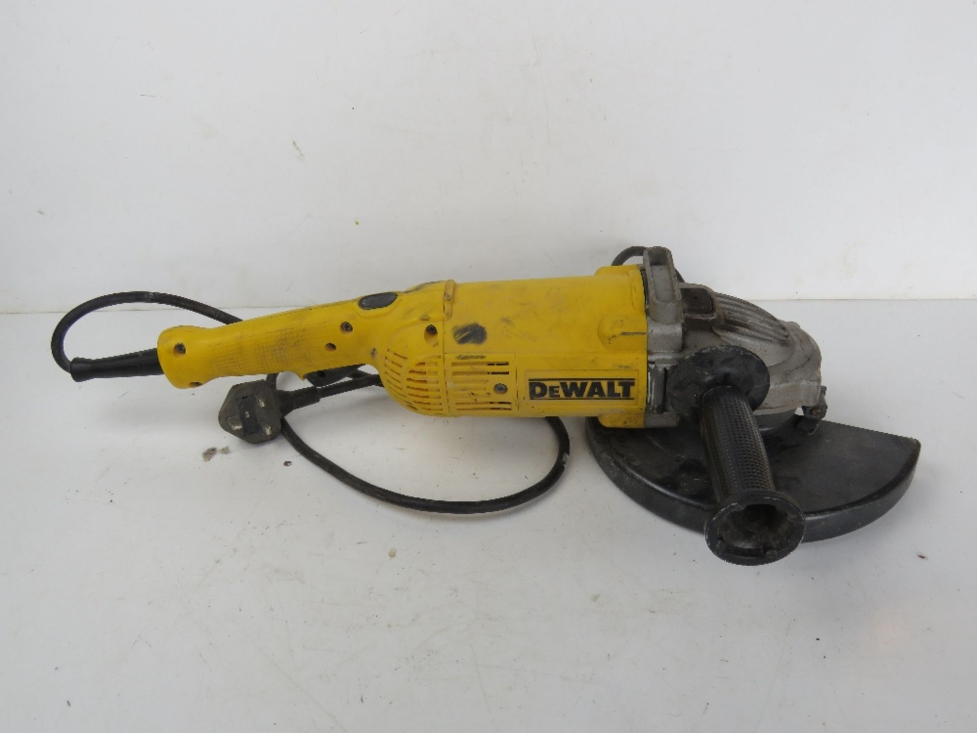 A DeWalt electric angle grinder. Collection of this item is from our Lower Boddington Saleroom.