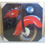 A contemporary canvas print of a red motorbike measuring 59.5 x 59.5cm.