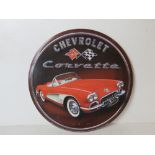 A contemporary metal Chevrolet Corvette sign measuring approx 30.5cm dia.