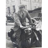 A photo of Stan Rodwell (of Stanley Phelps motorbike and parts shippers) on an AJS motorbike,