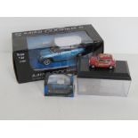 A die cast Mini Cooper 1:72 scale by Cararama together with a radio controlled Mini Cooper S and a