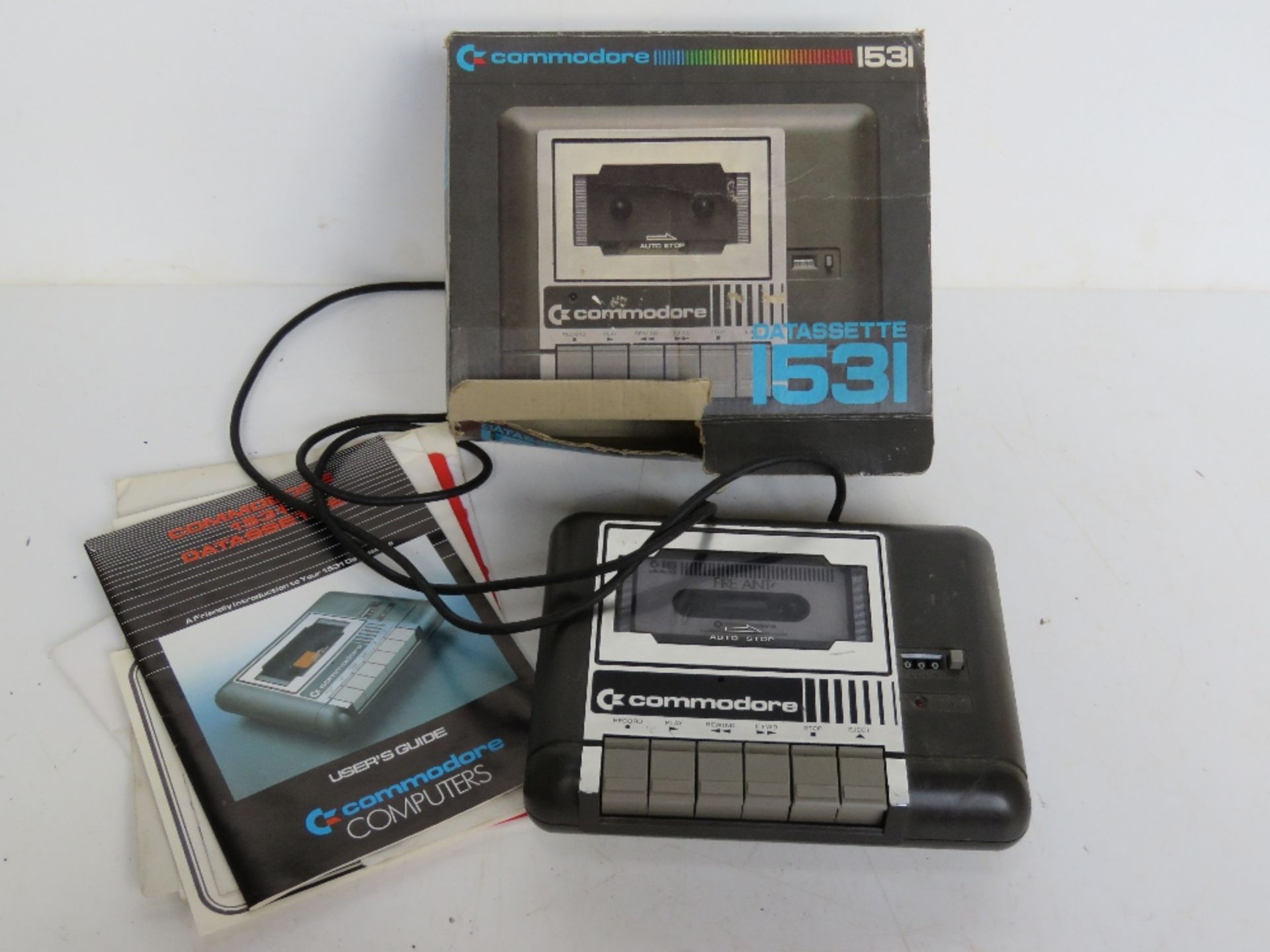 A Commodore Datassette 1531 with original box and user guide.