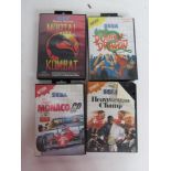 Four Sega game cartridges including Mortal Kombat Disclaimer - all items in this sale are sold as