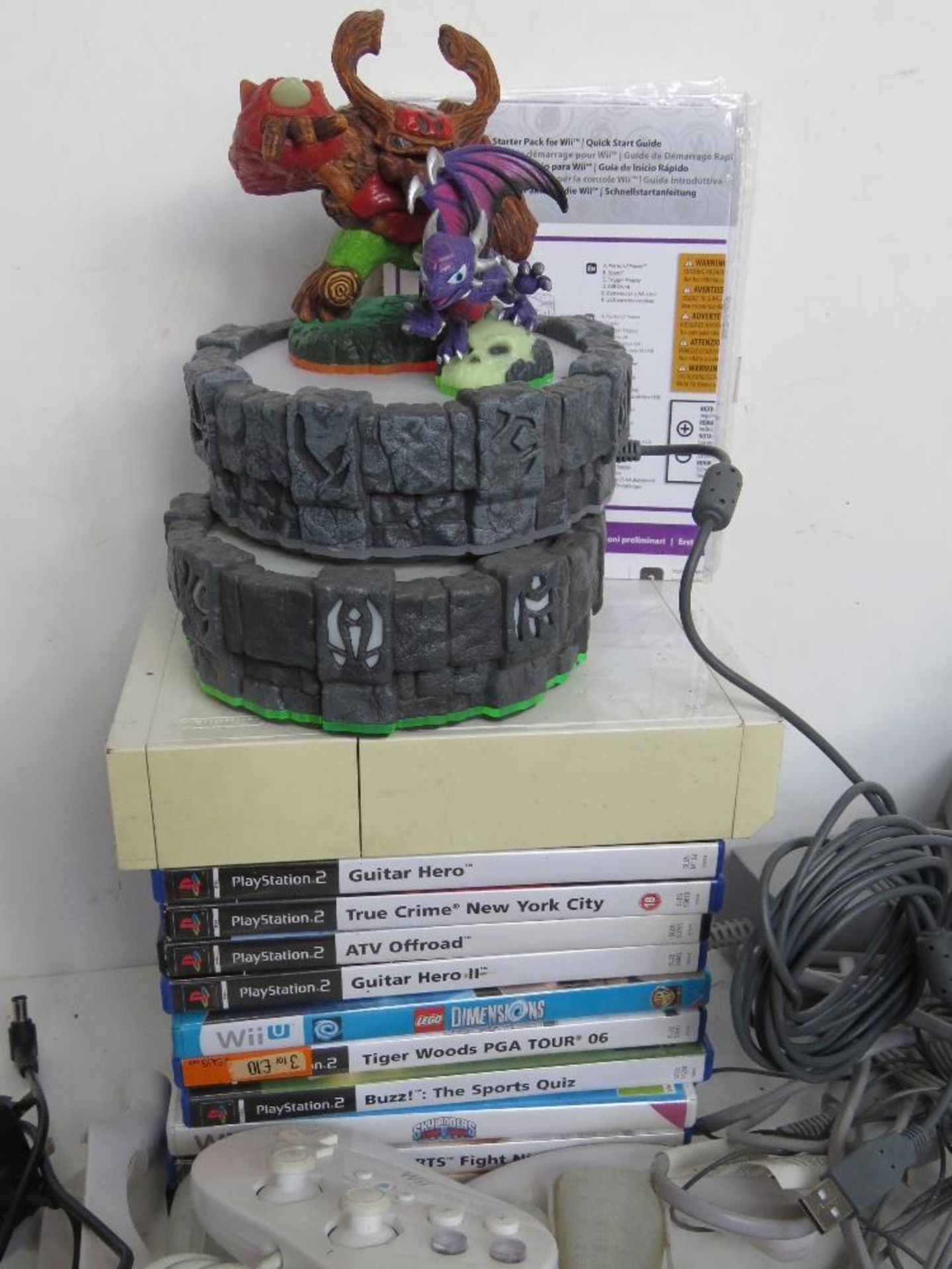 A quantity of assorted Wii and PS2 games accessories including two consoles and a collection of - Image 6 of 6