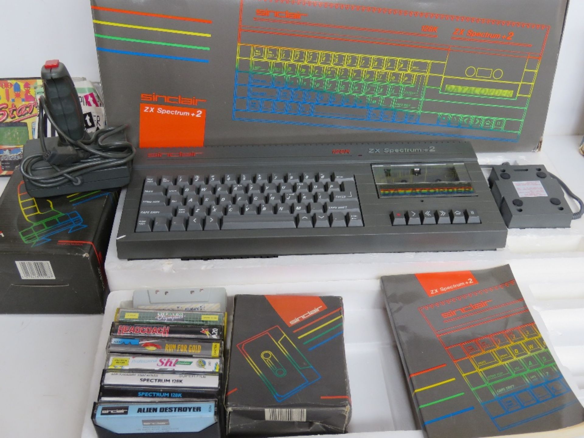 A Sinclair ZX Spectrum +2 with controller and games in original box, boxes showing signs of wear, - Image 3 of 4