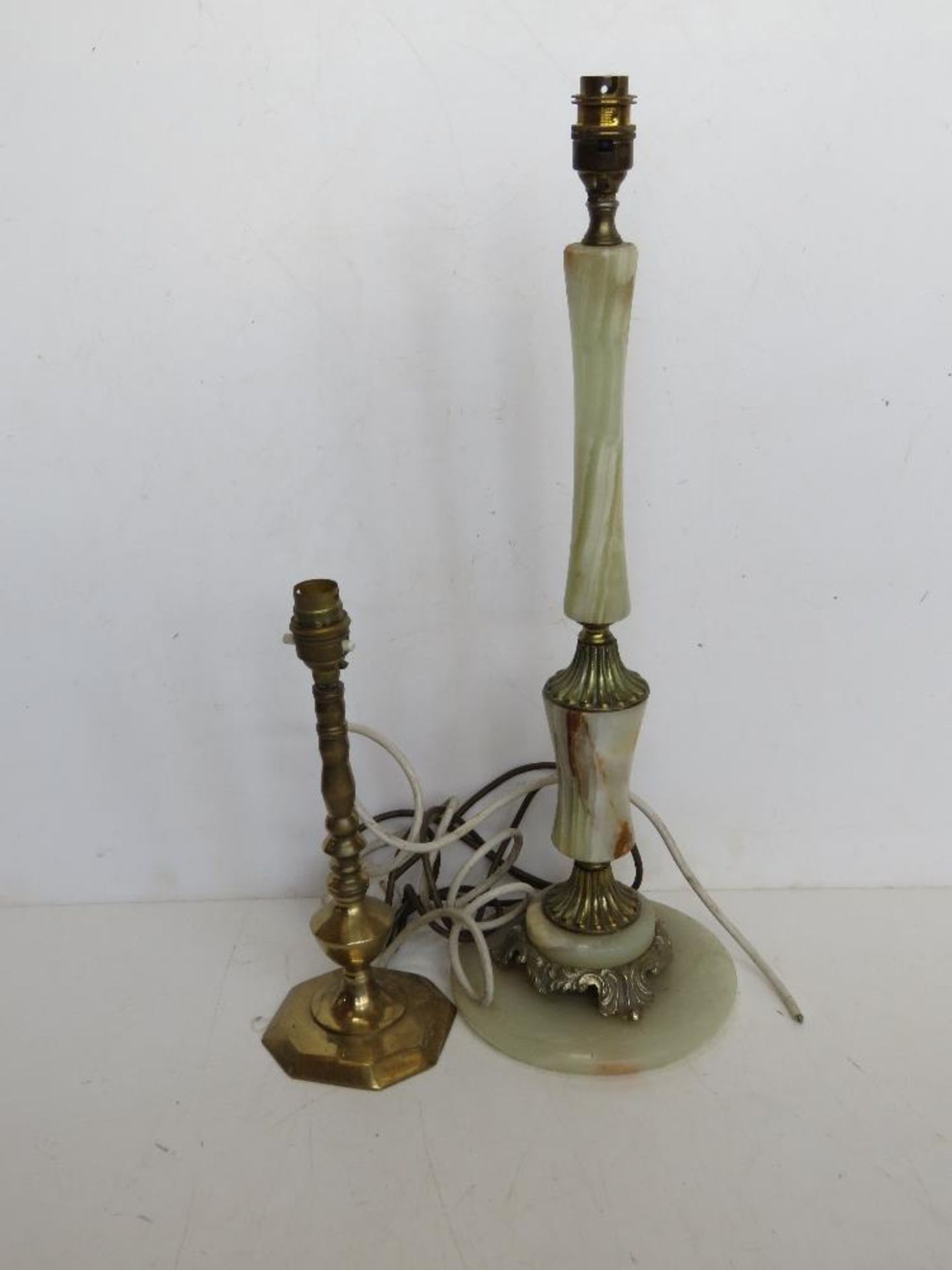 A brass candlestick type lamp and an onyx lamp. Both for rewiring.