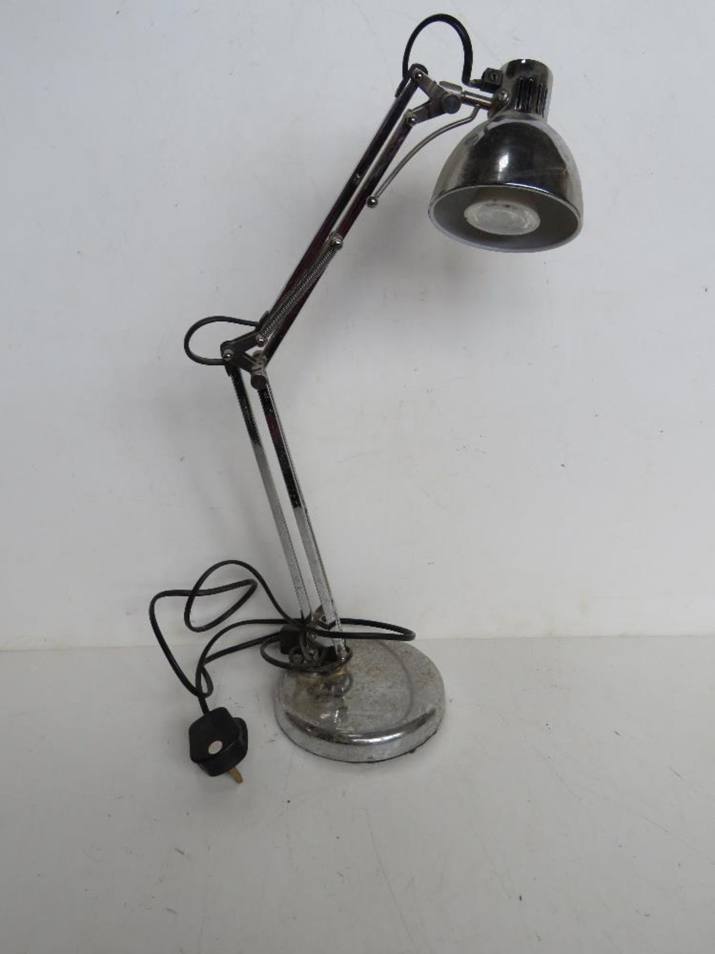 A chrome anglepoise type lamp Disclaimer - all items in this sale are sold as untested without