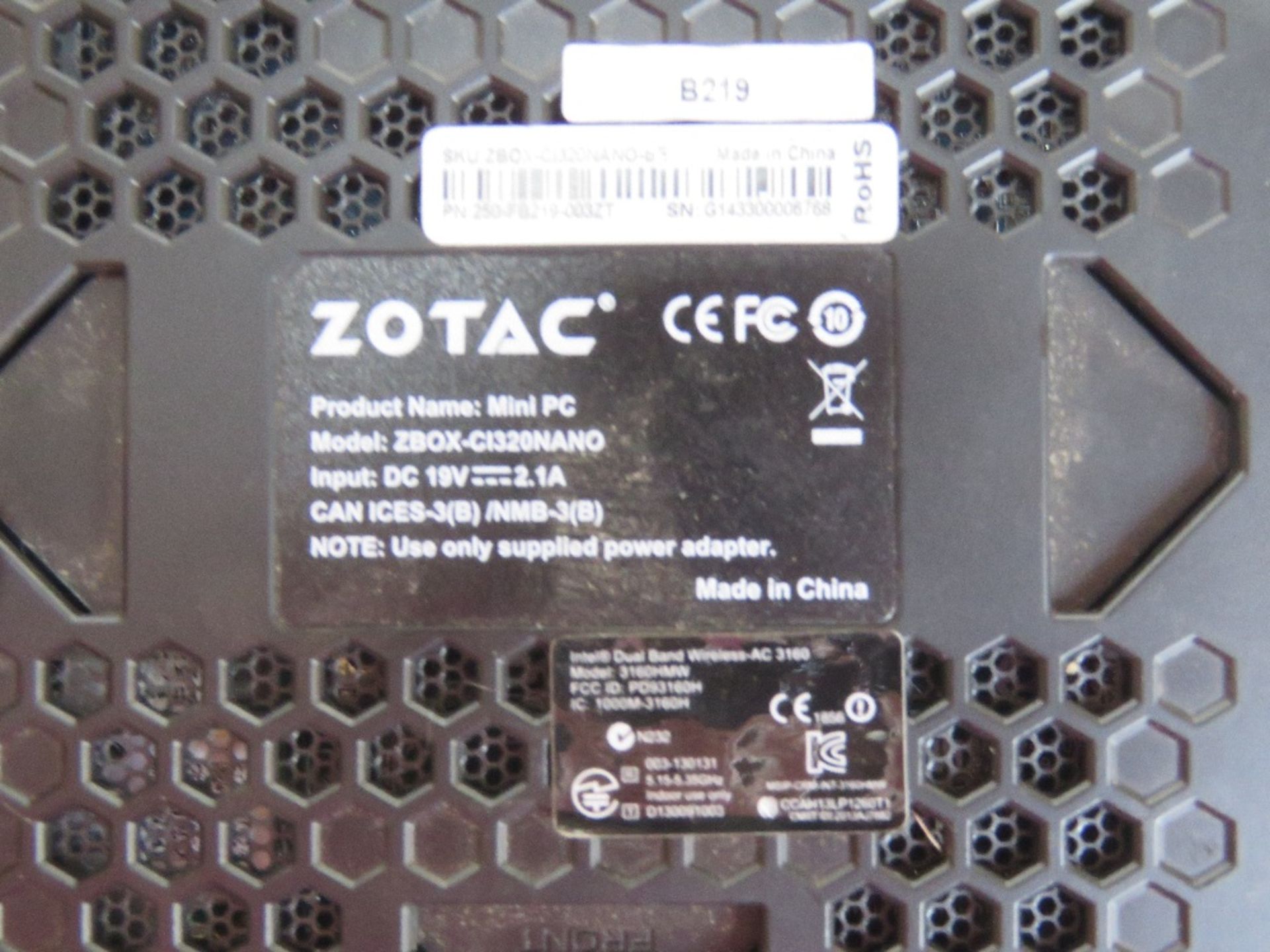 A Zotac mini desktop computer. - Image 2 of 2