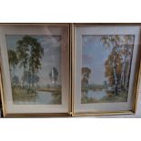 A pair of countryside themed prints, each being riverside theme and in matching frames,